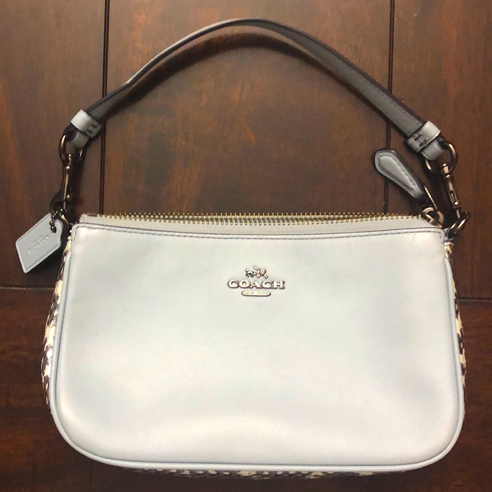 Coach wristlet, light blue with snake skin
